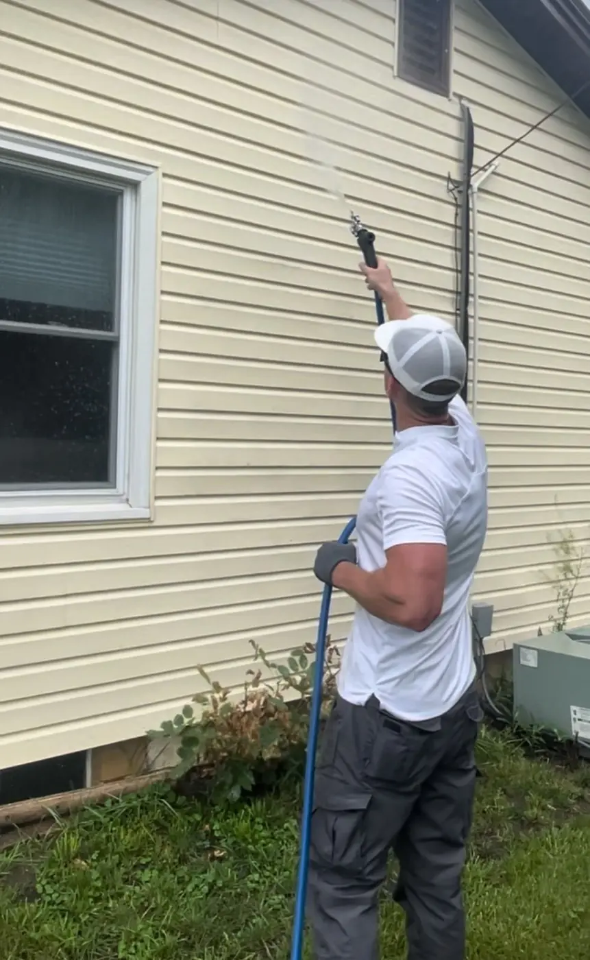 Soft washing vinyl siding